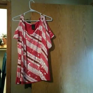Fun open shoulder top, can be dressed up or down.