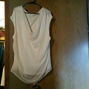 Calvin Klein, white blouse with shear overlay.