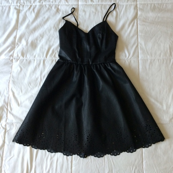 Black party dress. Faux leather.