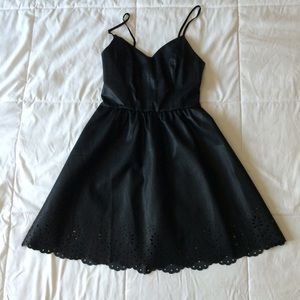 Black party dress. Faux leather.