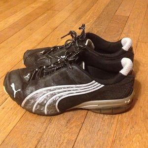 Black Puma sneakers athletic running shoes