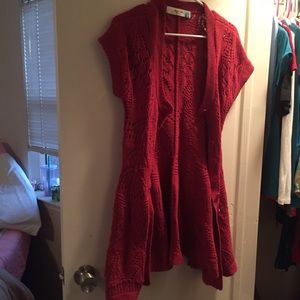 Red long short sleeve Sparrow sweater from anthro.