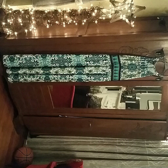 Peacock colored sleeveless dress
