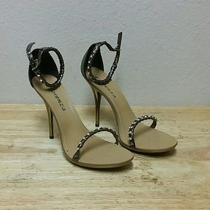 Size 7 Bronze Fiorenza Heels. Worn once.