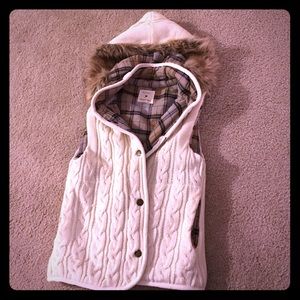 Cute vest with hood and flannel lining. Medium.