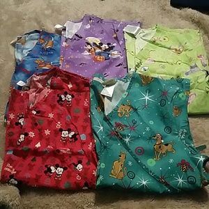 Scrub tops! All except one are Disney brand