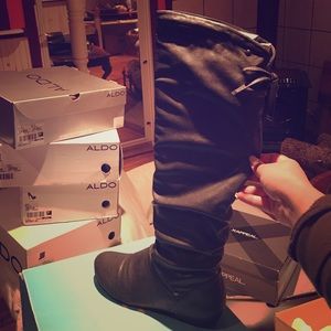 Grey to-the-knee flat boots