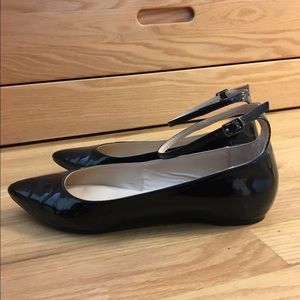 Black patent flats lightly worn