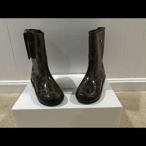 Dolce and Gabbana Leopard print rain boots.