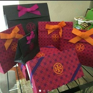 Tory Burch four shoe boxes