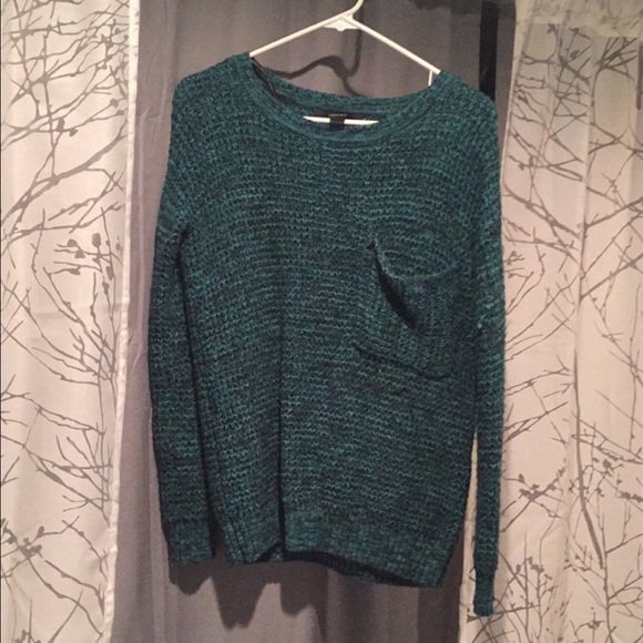 Green knitted sweater