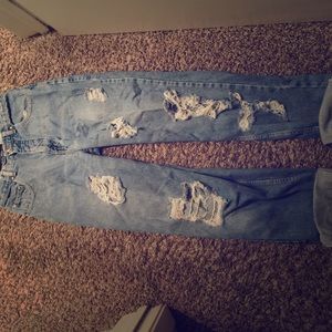 Washed hole jeans with rips and tears