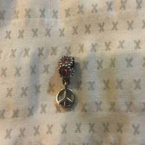 Dangling peace sign pandora charm