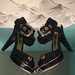 "Mimi" bebe black and gold platform heels