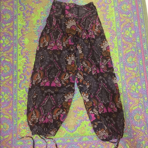 Boho baggy pants with drawstrings at the ankles.