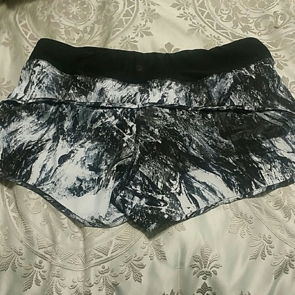 Black, grey, and white run shorts