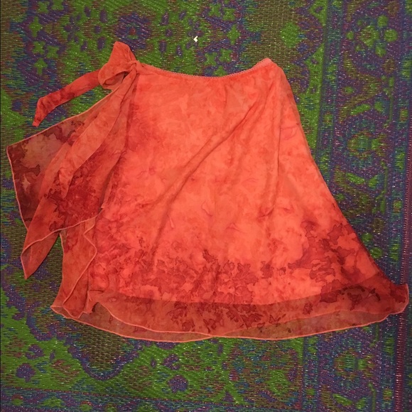 Knee length billowy skirt with elastic waistband.