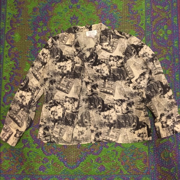 Silk blouse with newspaper print.