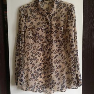 Animal print sheer blouse.