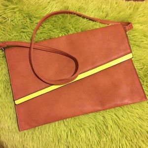 BROWN AND NEON YELLOW CLUTCH