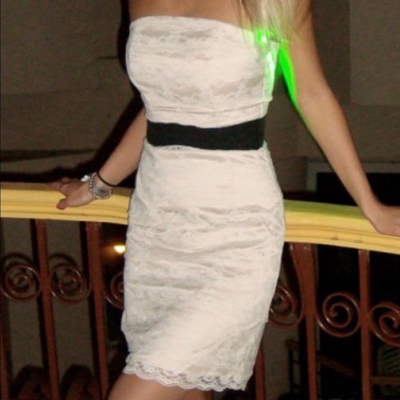 handmade lace dress on a high waist.