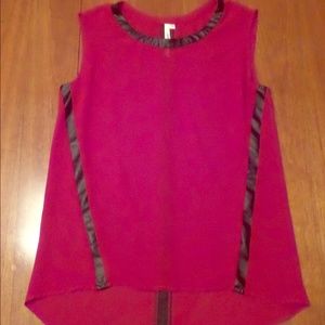 Red sleeveless blouse with leather trim