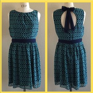 Blue open back sheath dress