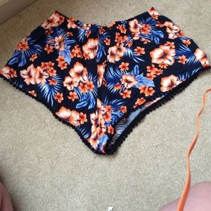 Floral vs pink shorts