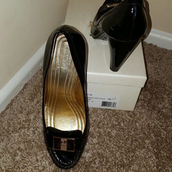 Very nice brown patent leather coach heels