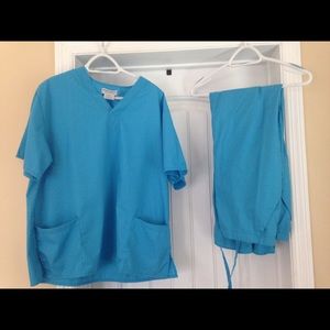 Natural Uniforms. runs big.Caribbean blue color.