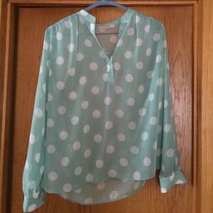 Light green and white polka dot blouse