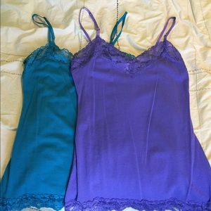 Two lace trim camisoles.