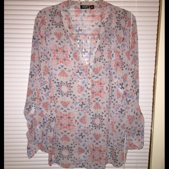 Sheer grey blouse with a flower like design