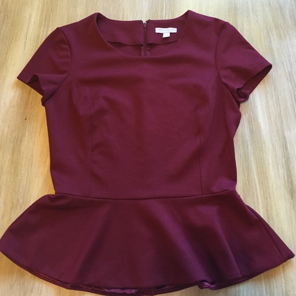 Burgundy peplum stretch top