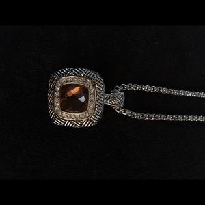 Citrine pendant on 18 inch chain.