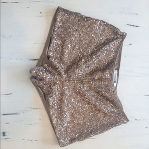 Champagne sequin shorts.