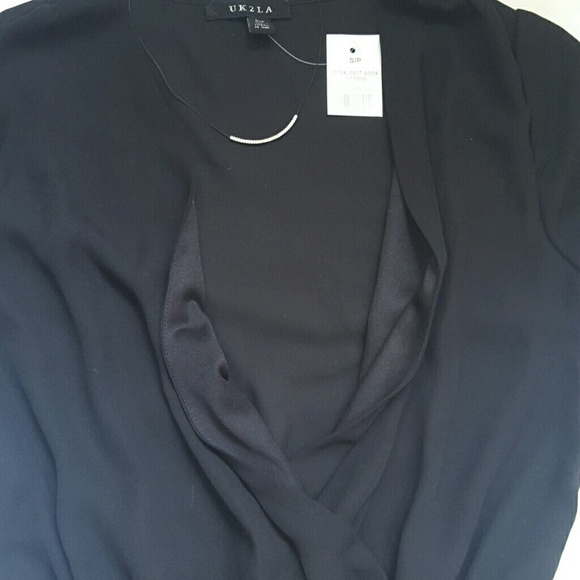 Black ruffle bottom shorts Romper - Picture 2 of 3