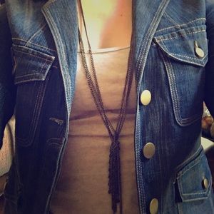 Cute aged gold necklace with brown beads.