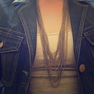 Gold multi-layer necklace.