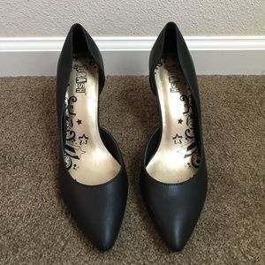 Black high heeled shoes