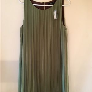 Ladies green pleated sleeveless dress