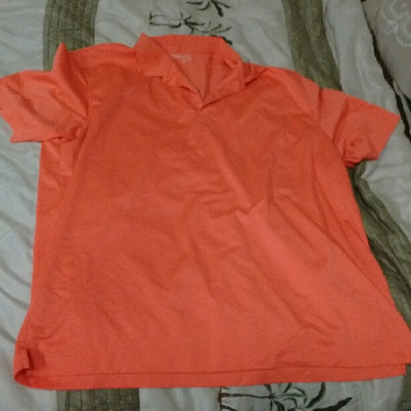 Salmon colored Nike Golf polo
