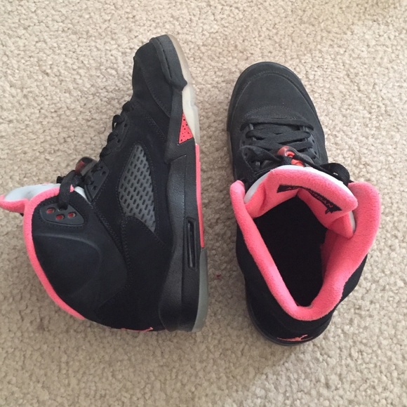 Black and pink Jordan's
