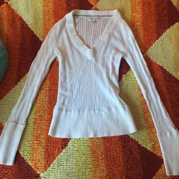 white tommy sweater