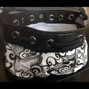 New black and white Bebe bag. No tag.