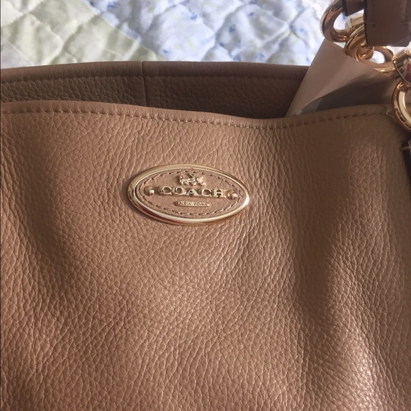 Beautiful nude coach tote bag.