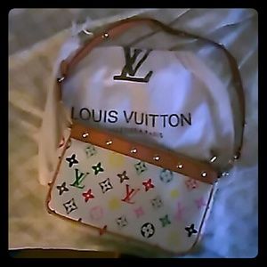 Non authentic louis vuitton clutch for sale