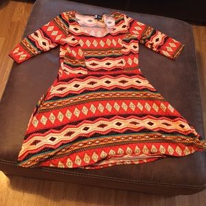 Cute Aztec print winter dress.