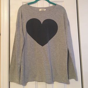 Long sleeve grey shirt with black heart in middle