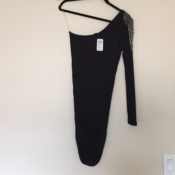 Black mini half shoulder dress.